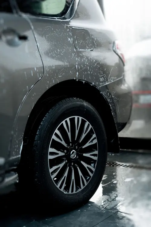 Wheel and tire detailing during a foam wash